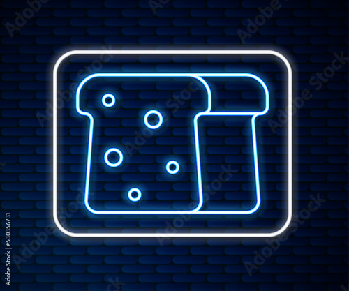 Glowing neon line Bread toast for sandwich piece of roasted crouton icon isolated on brick wall background. Lunch, dinner, breakfast snack. Vector