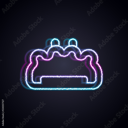 Glowing neon line Brass knuckles icon isolated on black background. Vector