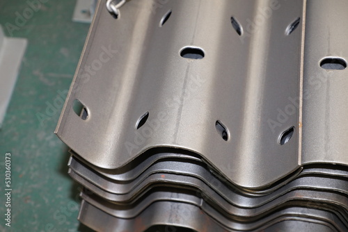 Sheet metal product after processing on a bending machine. Production of fastening from metal for construction.