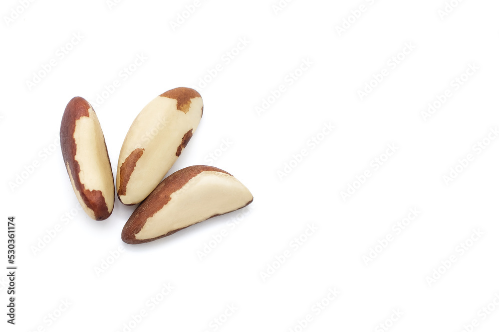 Brazil nuts lie on a white background with free space for text. Healthy Brazil nuts are rich in selenium and healthy fats. Diet vegetarian food. brazil nuts for a healthy lifestyle Brazil nuts lie on a white background with free space for text. Healthy Brazil nuts are rich in selenium and healthy fats. Diet vegetarian food. brazil nuts for a healthy lifestyle