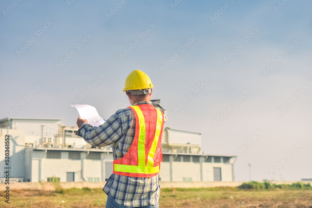 Senior Engineer Asian man working with tablet technology construction, construction worker with tablet computer and wearing construction uniform Senior Engineer Asian man working with tablet technology construction, construction worker with tablet computer and wearing construction uniform