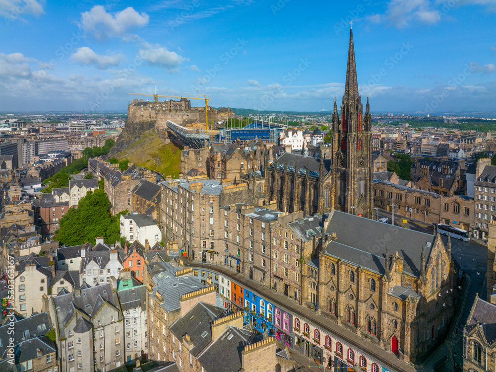 Old Town and Tolbooth Church on Royal Mile aerial view in Edinburgh, Scotland, UK. Old town Edinburgh is a UNESCO World Heritage Site since 1995. 