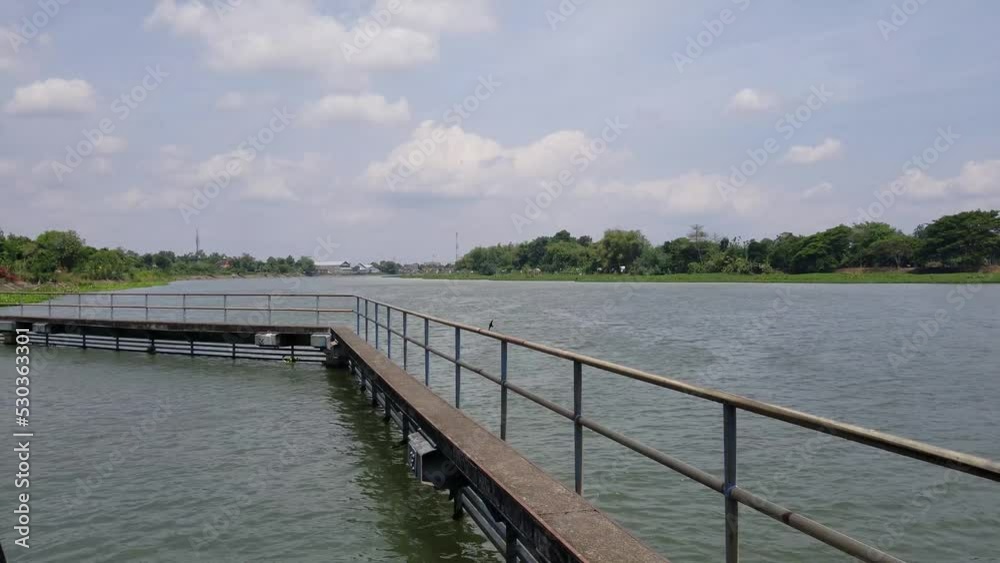 View of the Brantas river through Waru Turi weir View of the Brantas river through Waru Turi weir