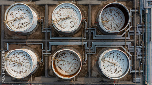 Aerial view crude oil storage tank, White storage tank farm chemical petroleum petrochemical refinery product, oil and gas fuel storage crude energy silos terminal.