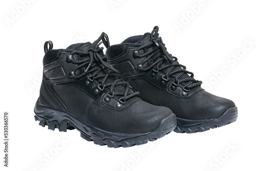 Pair of black leather winter sports shoes isolated on a transparent background.