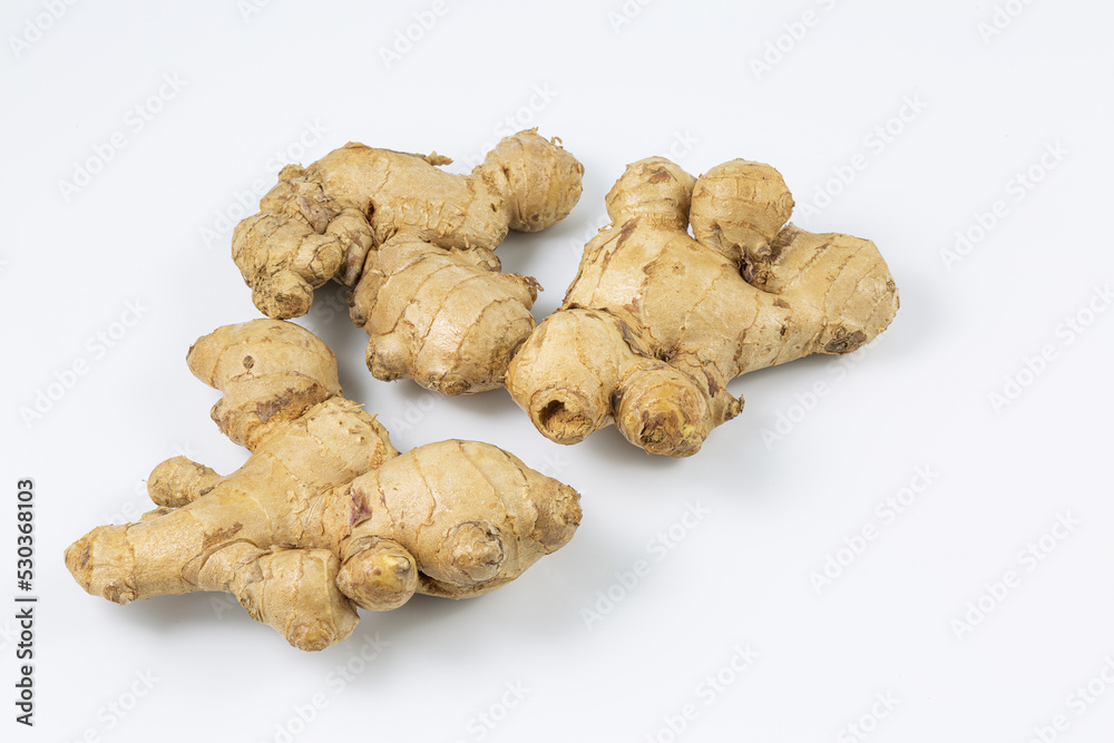 ginger on a white background,yellow fresh ginger laying on a white background ginger on a white background,yellow fresh ginger laying on a white background