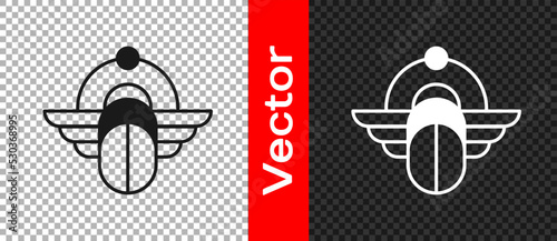 Black Egyptian Scarab icon isolated on transparent background. Winged scarab Beetle and sun. Vector