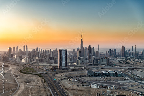 Aerial sunset view Dubai real estate investment expansion