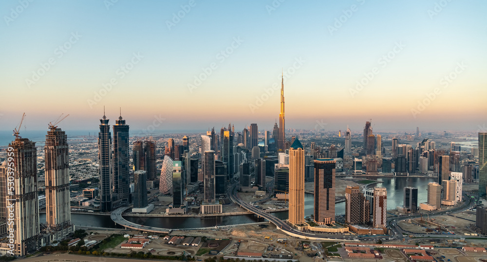 Aerial sunset view of Dubai city skyscrapers UAE