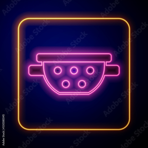 Glowing neon Kitchen colander icon isolated on black background. Cooking utensil. Cutlery sign. Vector