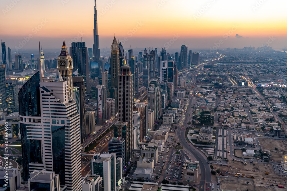 Aerial Dubai city skyscraper at sunset travel UAE
