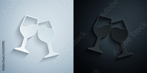 Paper cut Wine glass icon isolated on grey and black background. Wineglass sign. Paper art style. Vector