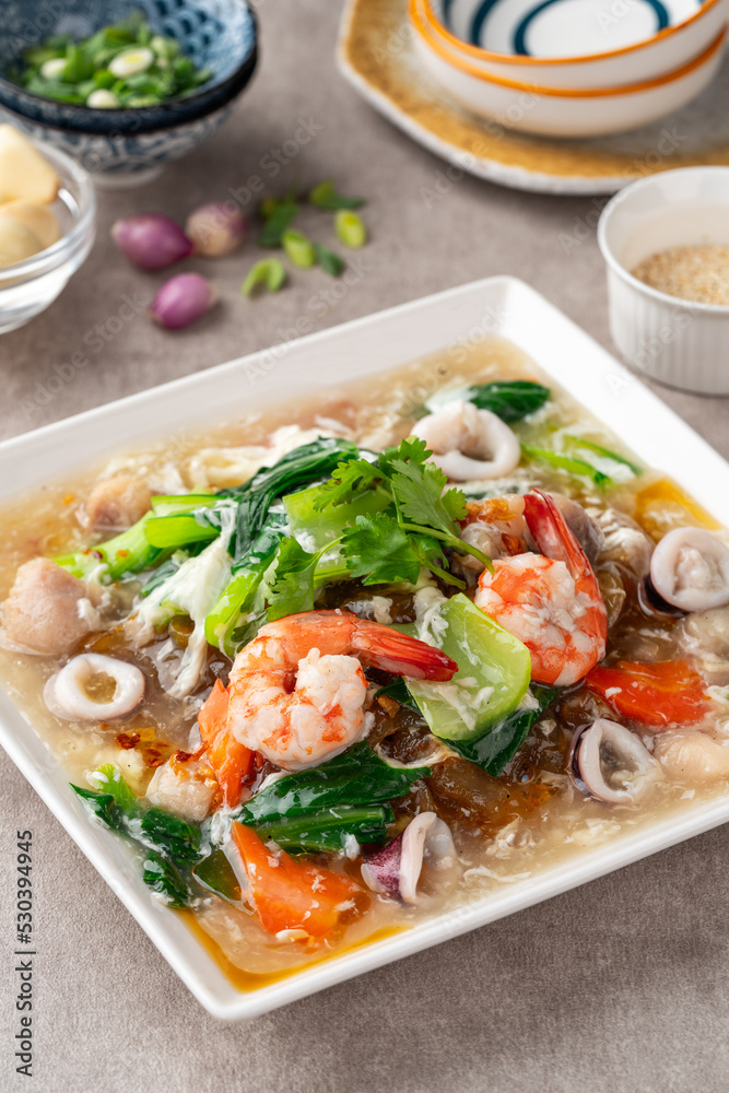 kwetiau siram is Chinese cuisine which is popular in Indonesia, cooked by frying added with complementary vegetables and chicken, seafood or beef meat and thick soup. kwetiau siram is Chinese cuisine which is popular in Indonesia, cooked by frying added with complementary vegetables and chicken, seafood or beef meat and thick soup.