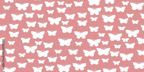 Seamless patten white butterflies on a pink background. Printing on fabric and paper.