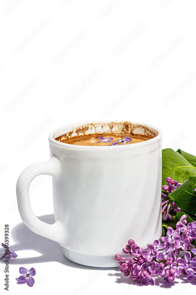 Cup of coffee and lilac flowers bouquet isolated on a white background. Breakfast springtime concept Cup of coffee and lilac flowers bouquet isolated on a white background. Breakfast springtime concept