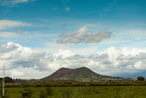 Landscape of a hill in Santa Maria Zacatepec, Puebla on a partly cloudy day