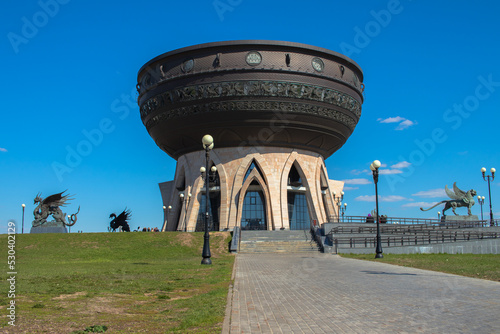 Cauldron family center on the blue sky background closeup with view point on the top.