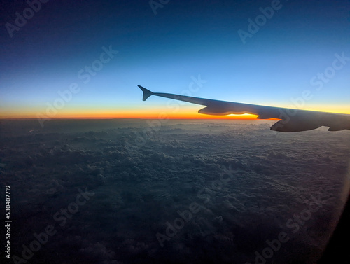 early morning sunrise from an airplane