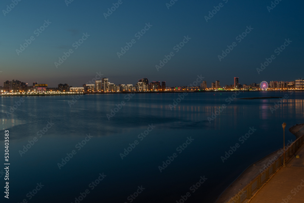 Night city view from the top on the river kazanka in Kazan at night. May 2022.