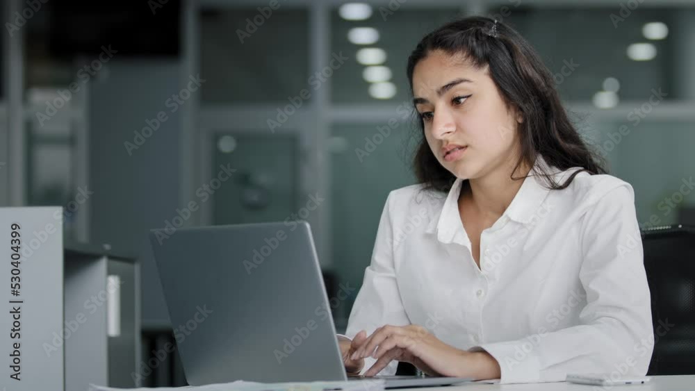 Tired young woman manager working on laptop feels overworked suffering from computer error loss important information due to device failure internet crash worried stressed girl experiencing problem