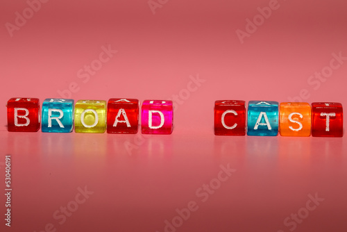 the word "broad cast" made up of cubes