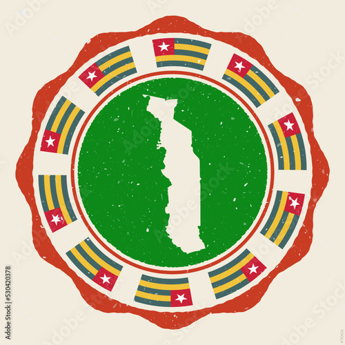 Togo vintage sign. Grunge round logo with a map and flags of Togo. Elegant vector illustration.