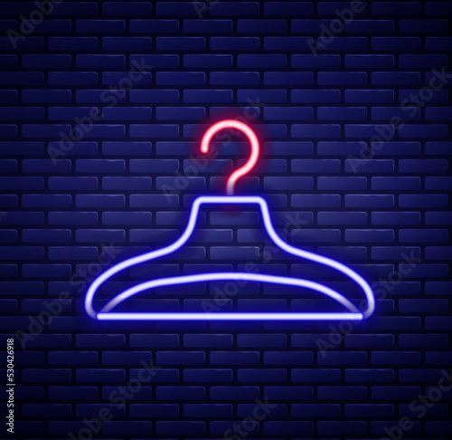 Glowing neon line Hanger wardrobe icon isolated on brick wall background. Cloakroom icon. Clothes service symbol. Laundry hanger sign. Colorful outline concept. Vector