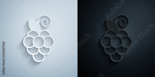 Paper cut Grape fruit icon isolated on grey and black background. Paper art style. Vector