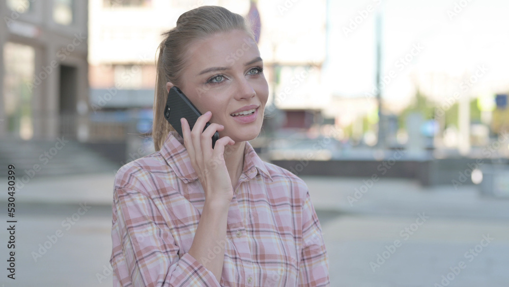 Young Woman Talking on Phone while Standing Outdoor Young Woman Talking on Phone while Standing Outdoor