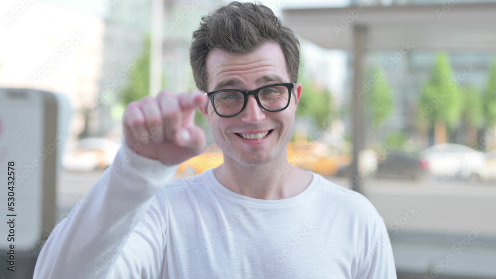 Young Man Pointing at the Camera Outdoor Young Man Pointing at the Camera Outdoor