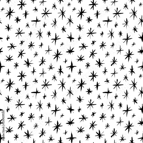 Seamless pattern with small snowflakes or stars. Christmas or New Year decoration. Hand drawn vector ornament with stylised snowflakes. Repeated texture for surface  wrapping paper  banners