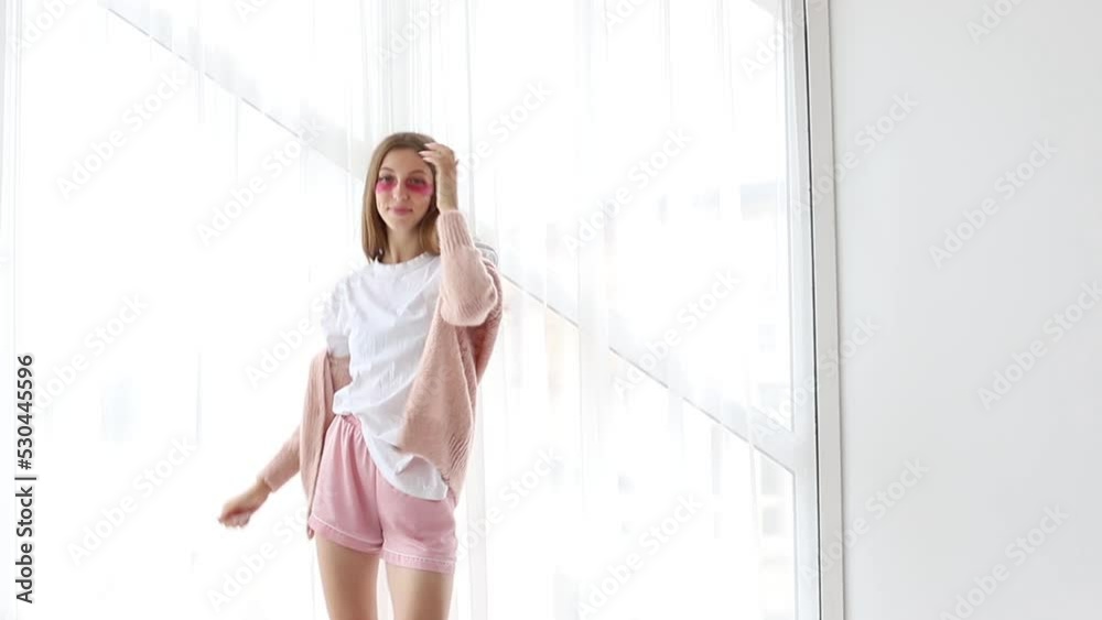 young woman in home clothes dancing at home young woman in home clothes dancing at home