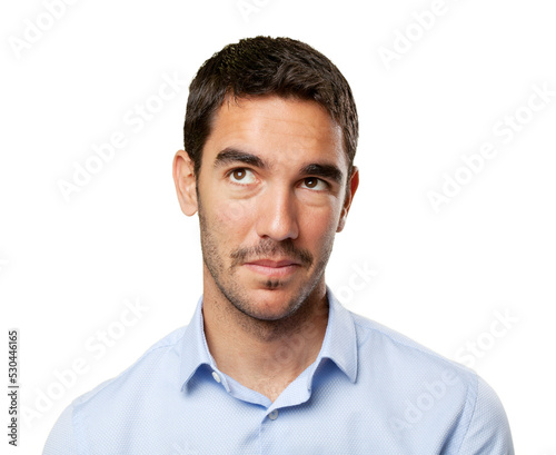 Close up of a young businessman wondering