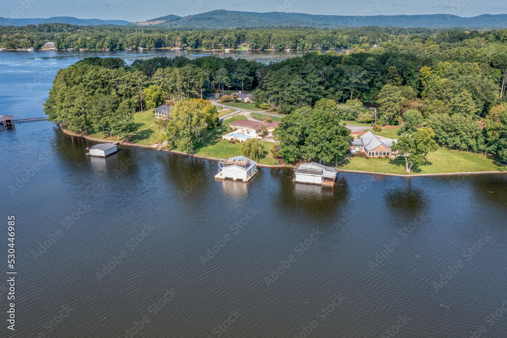 Aerial overhead view of lakefront homes and boat houses on Guntersville Lake in Scottsboro Alabama.