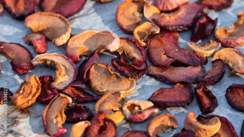 Sun dried apple slices. Raw organic dried apple fruit slices high angle view