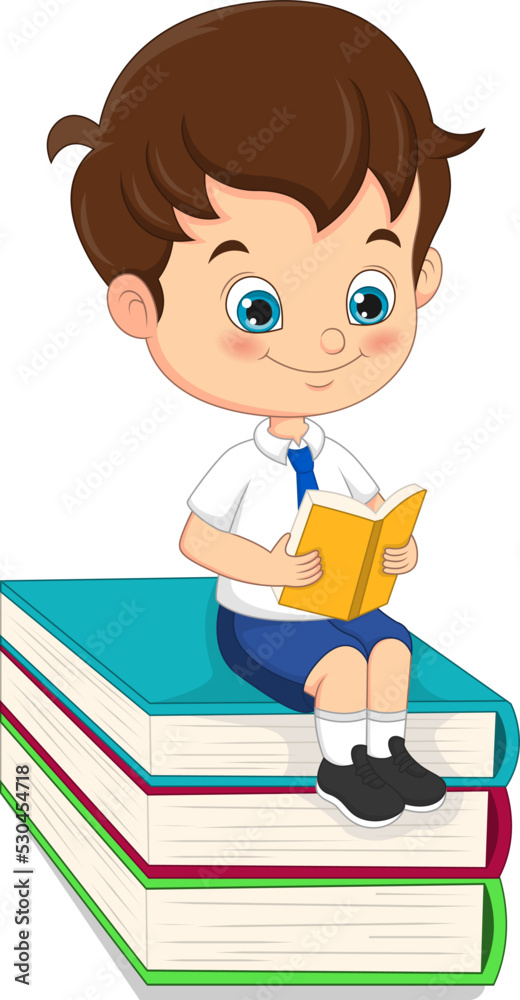 Cute school boy reading a book