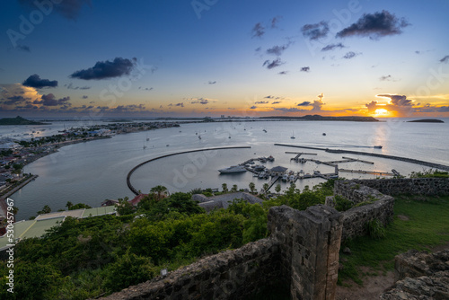 Sunset view from Fort Louis overlooking the harbour at Marigot on the French side of the Caribbean island of St Martin photo