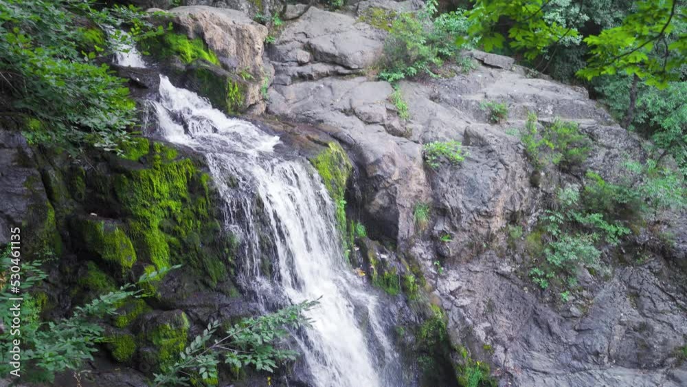 A flowing waterfall in the rainforest.
The waterfall in the forest is flowing.
A flowing waterfall in the rainforest.
The waterfall in the forest is flowing.