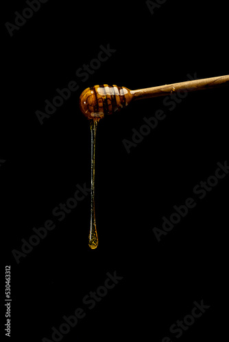 Foto Rosh Hashanah olive wood honey dipper
