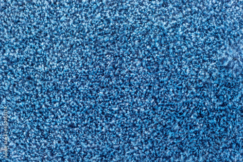Blue carpet texture background closeup