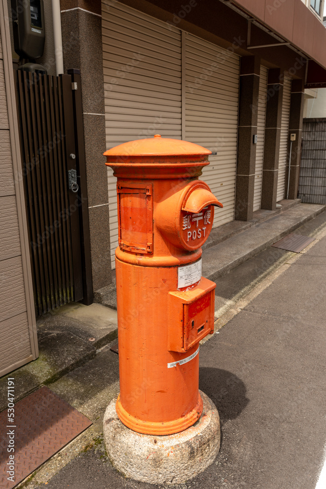 Traditional red postbox in Japan Traditional red postbox in Japan