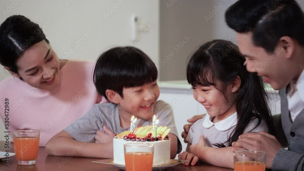 Happy family birthday. Asian family happy birthday for kid girl at home.