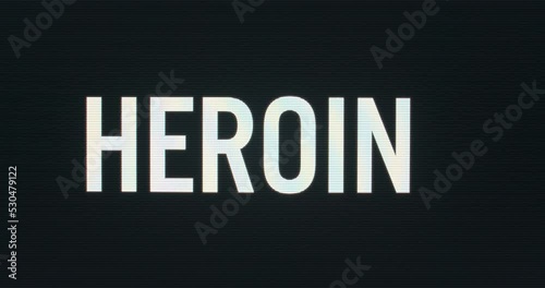 Closeup of Heroin being Typed onto Vintage Computer Monitor with Blinking Cursor. Digital Words Intro CRT LCD TV Screen Pixels Macro Detail 4K photo