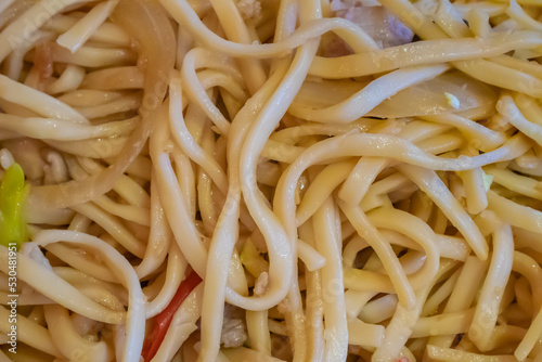 Yaki udon noodles, a close up of Japanese homemade fried noodle food background.