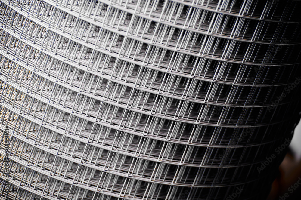 Obraz premium Roll of welded wire mesh in cold production plant storehouse