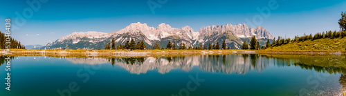 High resolution panorama with reflections in a lake at the famous Astberg summit, Going, Wilder Kaiser, Tyrol, Austria
