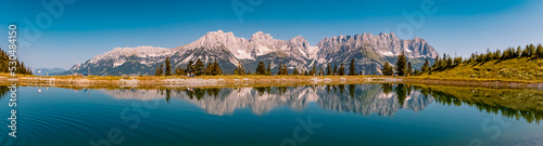 High resolution panorama with reflections in a lake at the famous Astberg summit, Going, Wilder Kaiser, Tyrol, Austria © Martin Erdniss