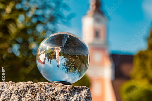 Quadro su tela Crystal ball landscape shot with a church at Kuenzing, Bavaria, Germany