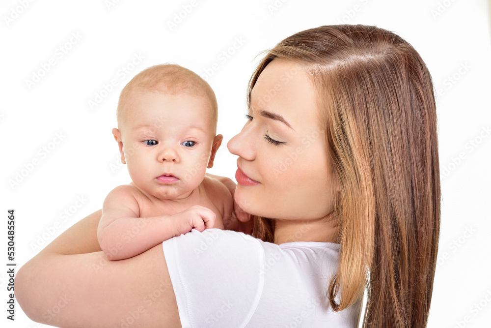 Mother and baby playing and smiling. Happy family. Mother and baby playing and smiling. Happy family.