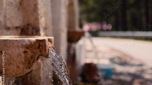 Wallpaper Mural Spring water coming out of a stone fountain in the forrest Torontodigital.ca
